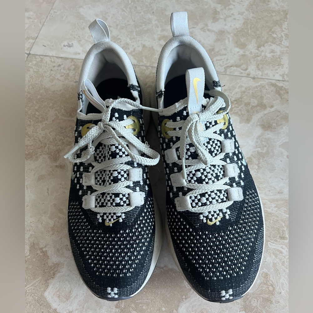 Nike black gold sneakers